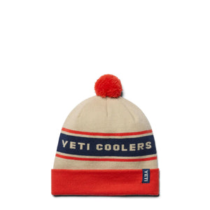 Czapka z pomponem biała / pomarańczowa YETI